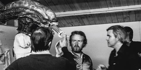 h r giger on set creating the props set pieces and costumes for