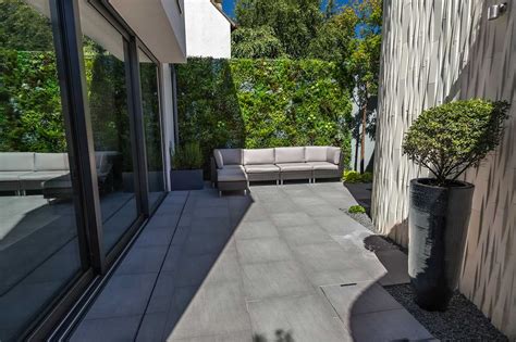small courtyard garden design bespoke artificial green wall panels