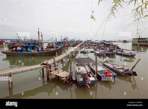 fishing boats moored   batu maung fishing village   south  penang island stock photo