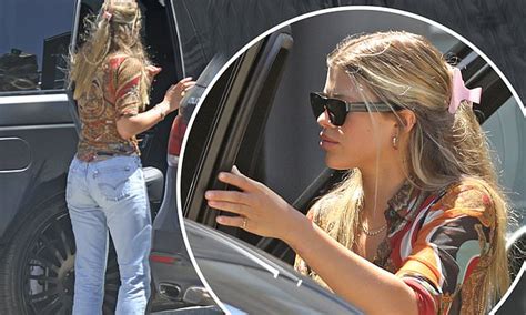 sofia richie is stylish in patterned blouse and frayed jeans as she
