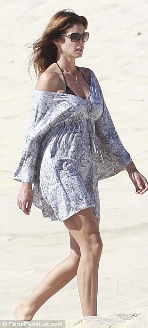 Cindy Crawford Hides Her World Famous Figure Under A Floating Kaftan As
