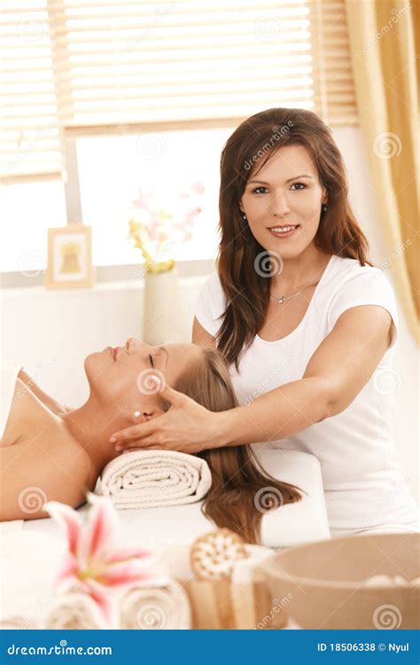 Masseur Doing Massage On Woman Body In The Spa Salon Woman Relaxed