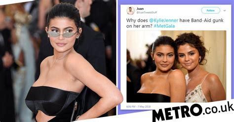 fans can t figure out if kylie jenner is wearing a band aid to the met