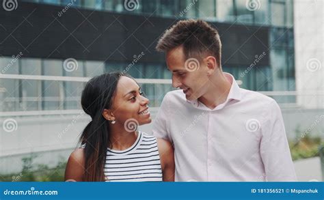 Close Up Of Cheerful Multiracial Couple In Love Kissing Each Other On
