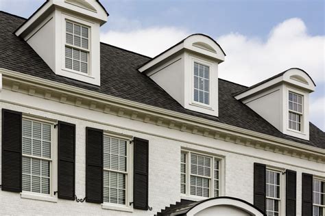 close  photograph   dormer windows   arched cap  contrasts   angular