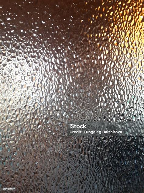 Photograph Closeup Of Glass Embossed Surface With Refractive Light