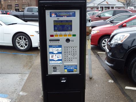 parking enforcement officer  explain  parking kiosk  franklin