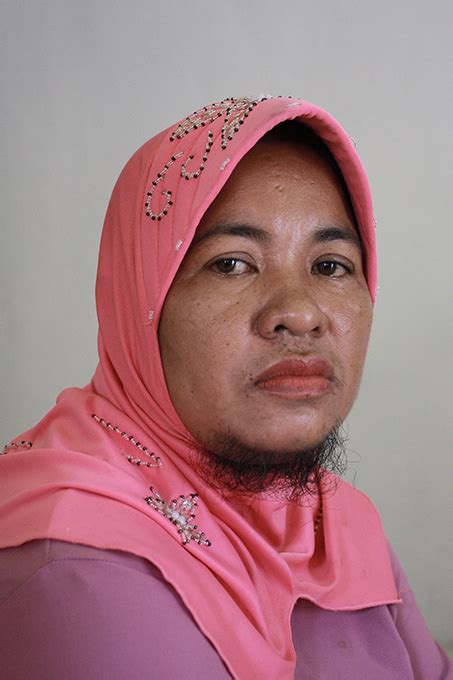Indonesian Woman Hides Her Beard For 13 Years 6