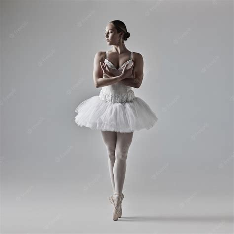 premium photo dance  ballet   jumping full   beautiful young ballet dancer