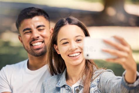 Outdoor Couple And Smile With A Selfie For Love Care And Happiness