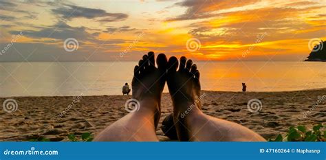 sunset foot   beach stock photo image  layan