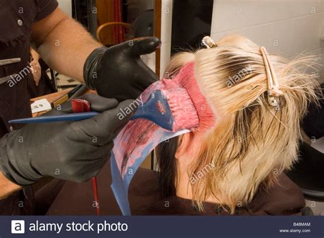 woman bleach hair salon  res stock photography  images alamy
