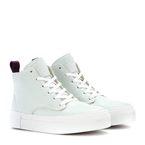 eytys odyssey leather high top sneakers  white lyst