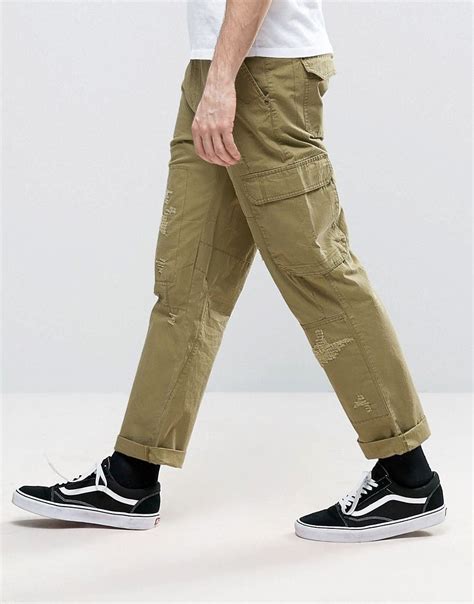 asos slim cargo pants  rip repair detail  khaki green asos menswear mens cargo