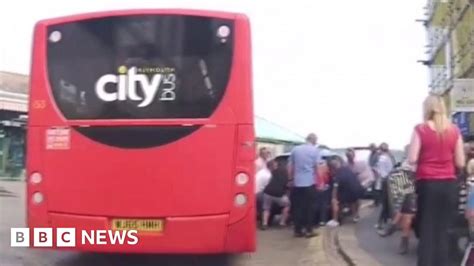 Men In Plymouth Bounce Car Out Of Way Of Bus Bbc News