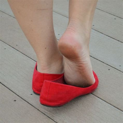 pin on women feet showing soles in sandals