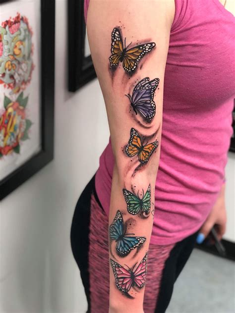 butterfly arm tattoo colorful butterfly tattoos  arm butterfly