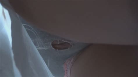 hole in panties reveals her pussy voyeur videos