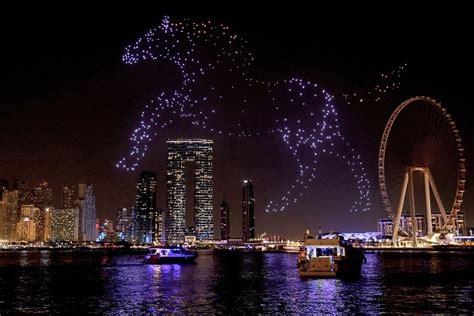 dazzling drone light show illuminates dubai sky  pics