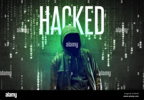 faceless hacker  hacked inscription hacking concept stock photo
