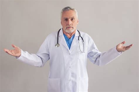 handsome mature doctor stock photo image  general
