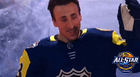 ice hockey kiss by nhl find and share on giphy