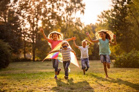 group  happy children running  public park review  myopia