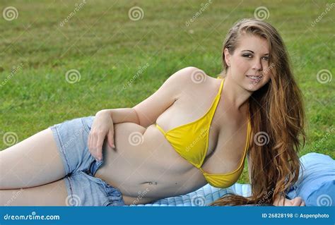 young woman laying  summer royalty  stock  image
