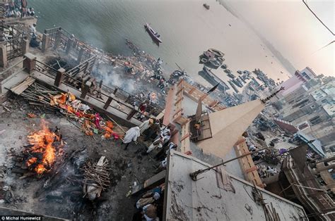 incredible pictures of the funeral fires which line the ganges daily