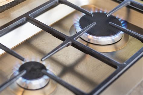 remove grease  gas cooktop burners