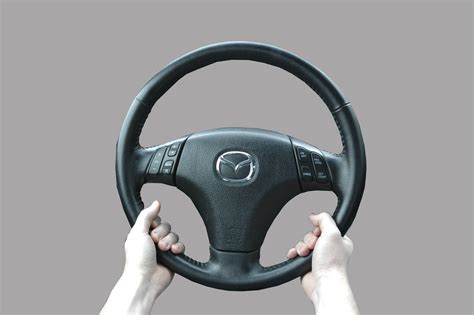 hold   hold  steering wheel driver education