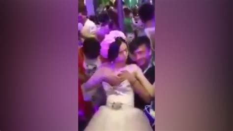 Bride Lets Guests Pull Down Dress And Grope Her Breasts To Raise Money