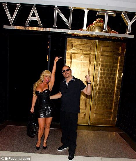 ice t s wife coco leaves little to the imagination in her skin tight very low cut party dress