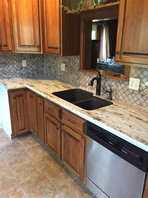 River Gold Formica Countertops With Tyvarian Tile Backsplash With