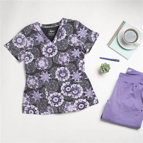 the beautiful vintage medallion scrub top gives you a fresh look for the season featuring a