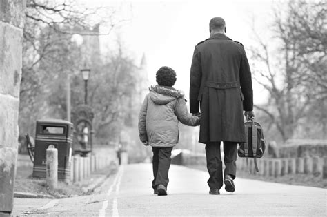 father walking son  school  path safe  michigan