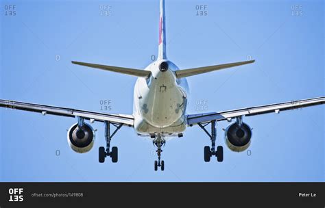 view  airplane flying   sky stock photo offset