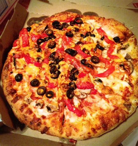 dominos pizza  hot sauce roasted red peppers mushrooms  olives dominos pizza