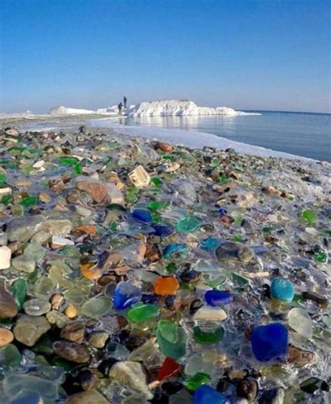 dumped glass on ussuri bay in russia has been shaped into