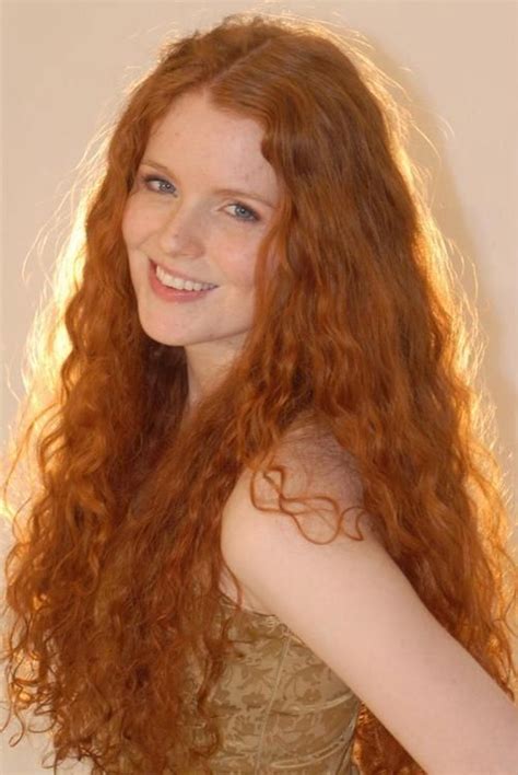 beautiful redhead with long curly hair curls curls