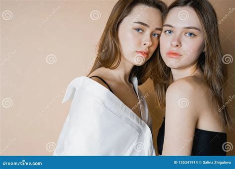 Adult Twin Sisters Posing Nude