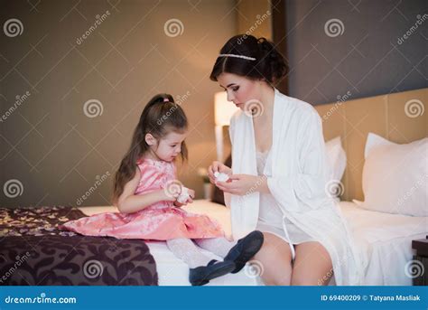 Mom Plays With Her Daughter On Bed And Hugging Stock Image Image Of