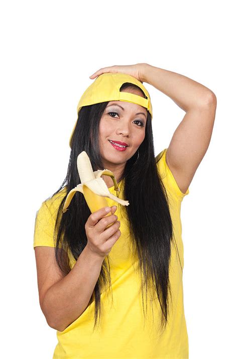 Asian Woman Eating A Banana Photograph By Joe Belanger Fine Art America