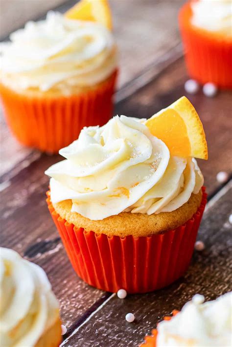 orange cupcakes with cream cheese frosting biscuits and burlap