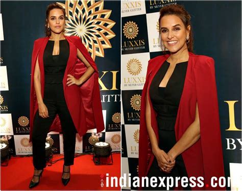Neha Dhupia Adds A Pop Of Colour To Her All Black Formal Outfit And She