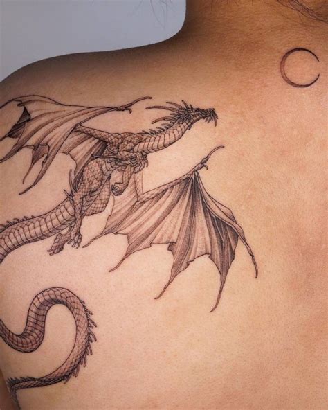 Large Dragon Tattoo Done On The Shoulder Blade