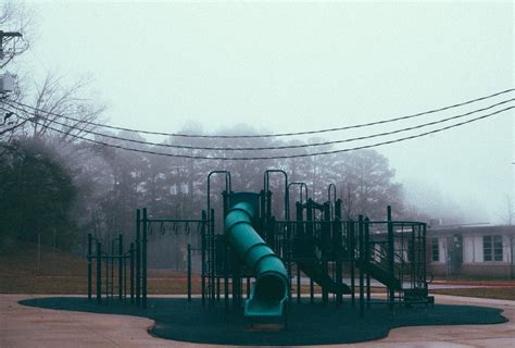 Dark Moody Foggy Playground Scene For My Latest Photography Series