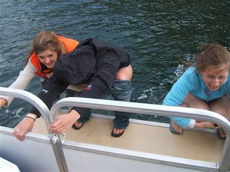 Girl Peeing Off Boat