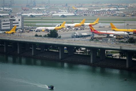 hong kong   edge  asias air transport hub  dhl   logistics firms