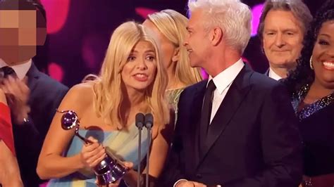phillip schofield and lover spotted on ntas stage as they share a look